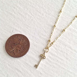 Minerva Tiny Key Necklace